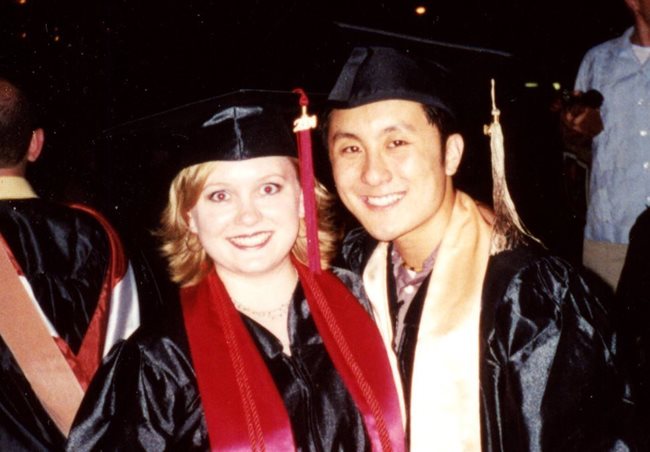 two people with graduation caps and gowns