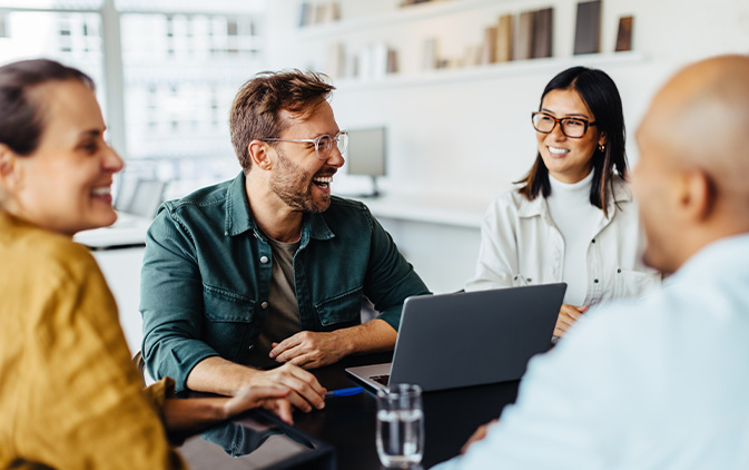 group of business people in casual clothes in conference room