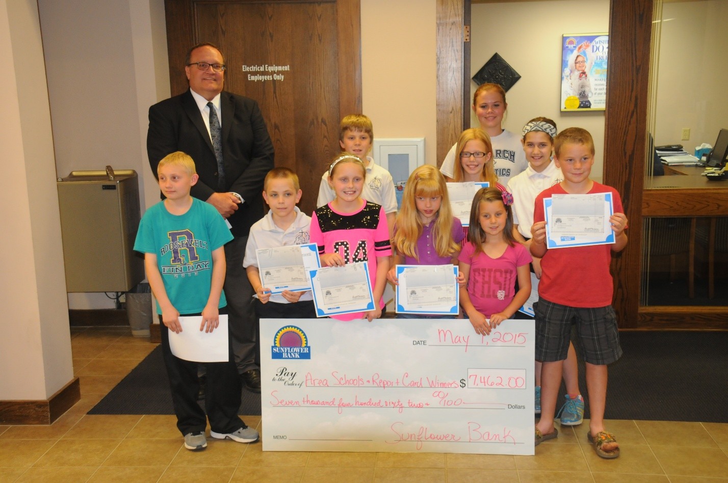 group of children with big check