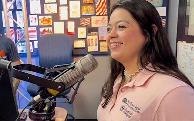 women talking in radio microphone