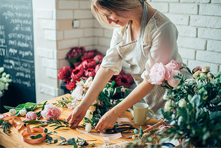 woman cutting flowers