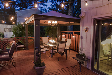 Backyard deck with table and chairs
