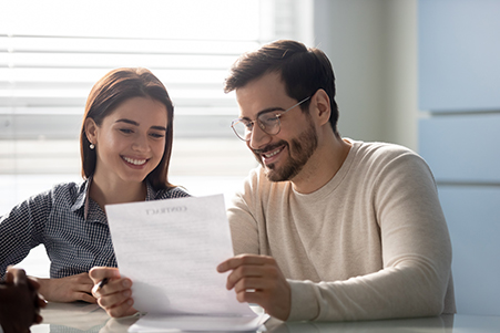 couple looking at paper