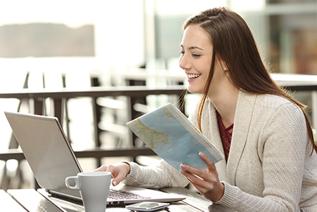 woman reading and on laptop