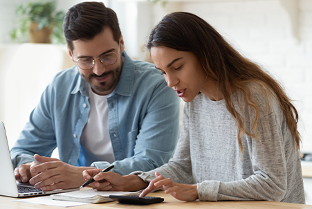 couple looking at tablet