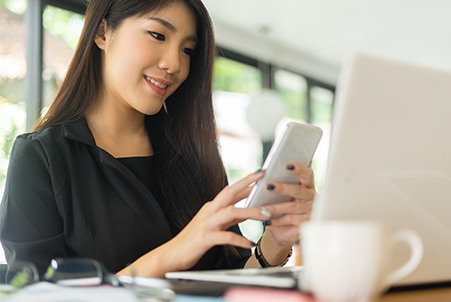 woman holding phone
