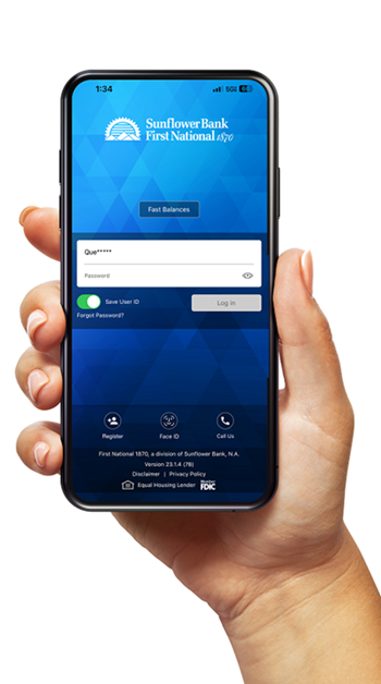 person holding iphone with banking login screen